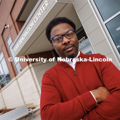 Charles Chioma Nwaizu, Assistant Professor of Practice in Food Science and Technology, is photographed outside the Food Innovation Center on Nebraska Innovation Campus. March 21, 2023. Photo by Craig Chandler / University Communication.